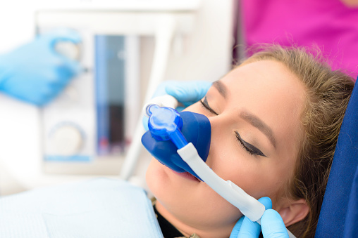 Girl getting nitrous oxide at Downey Oral and Maxillofacial Surgery 
